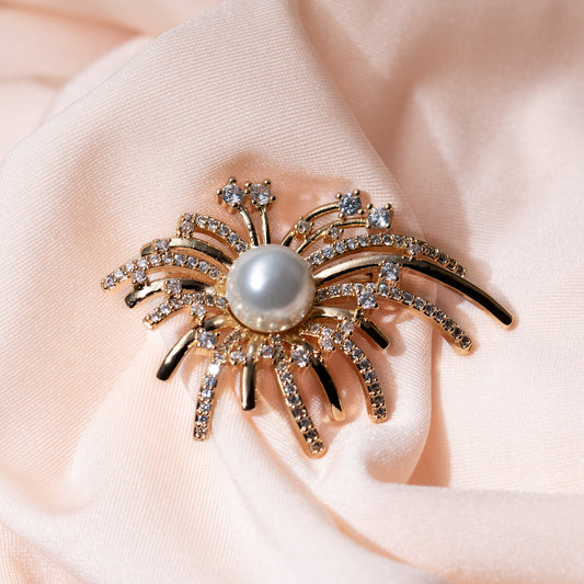 Round brooch with crystal decoration
