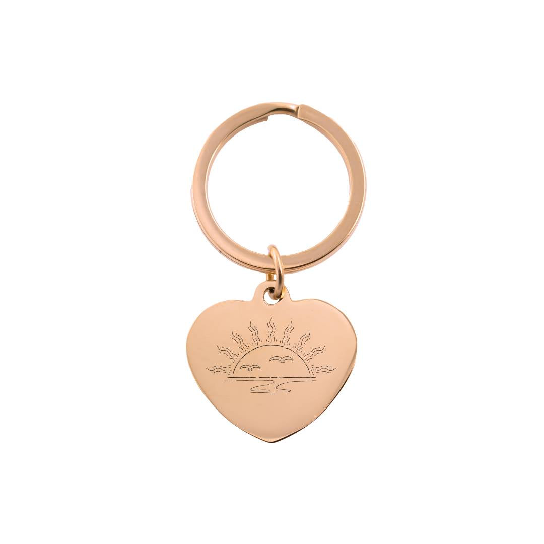 Sirds formas atslēgu piekariņš ar attēla gravējumu zelta apdarē