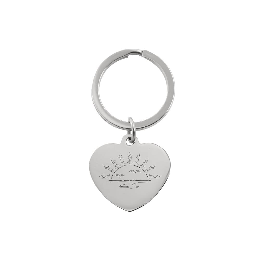 Sirds formas atslēgu piekariņš ar attēla gravējumu sudraba apdarē